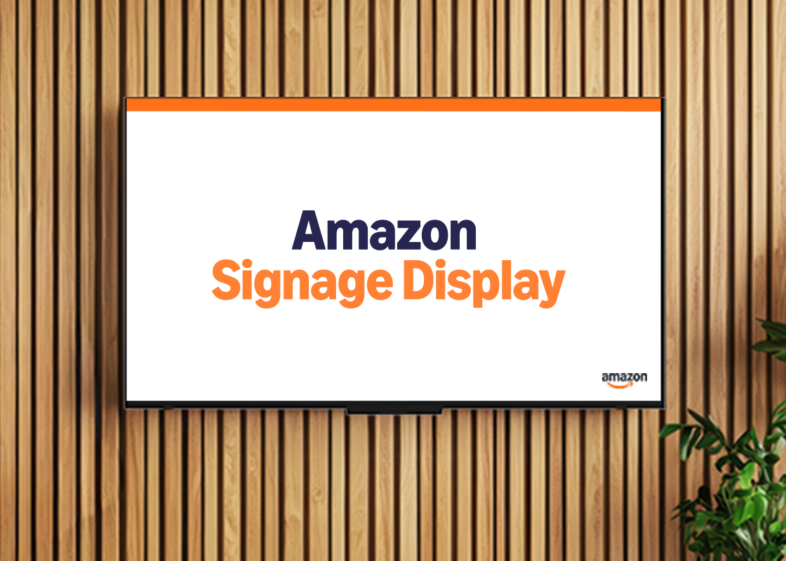 Amazon Signage Display mounted without a stand on a wooden slat wall