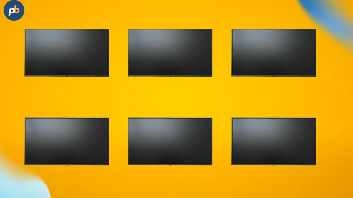 Six wall-mounted digital signage screens representing unlimited screens and locations on Business Pro